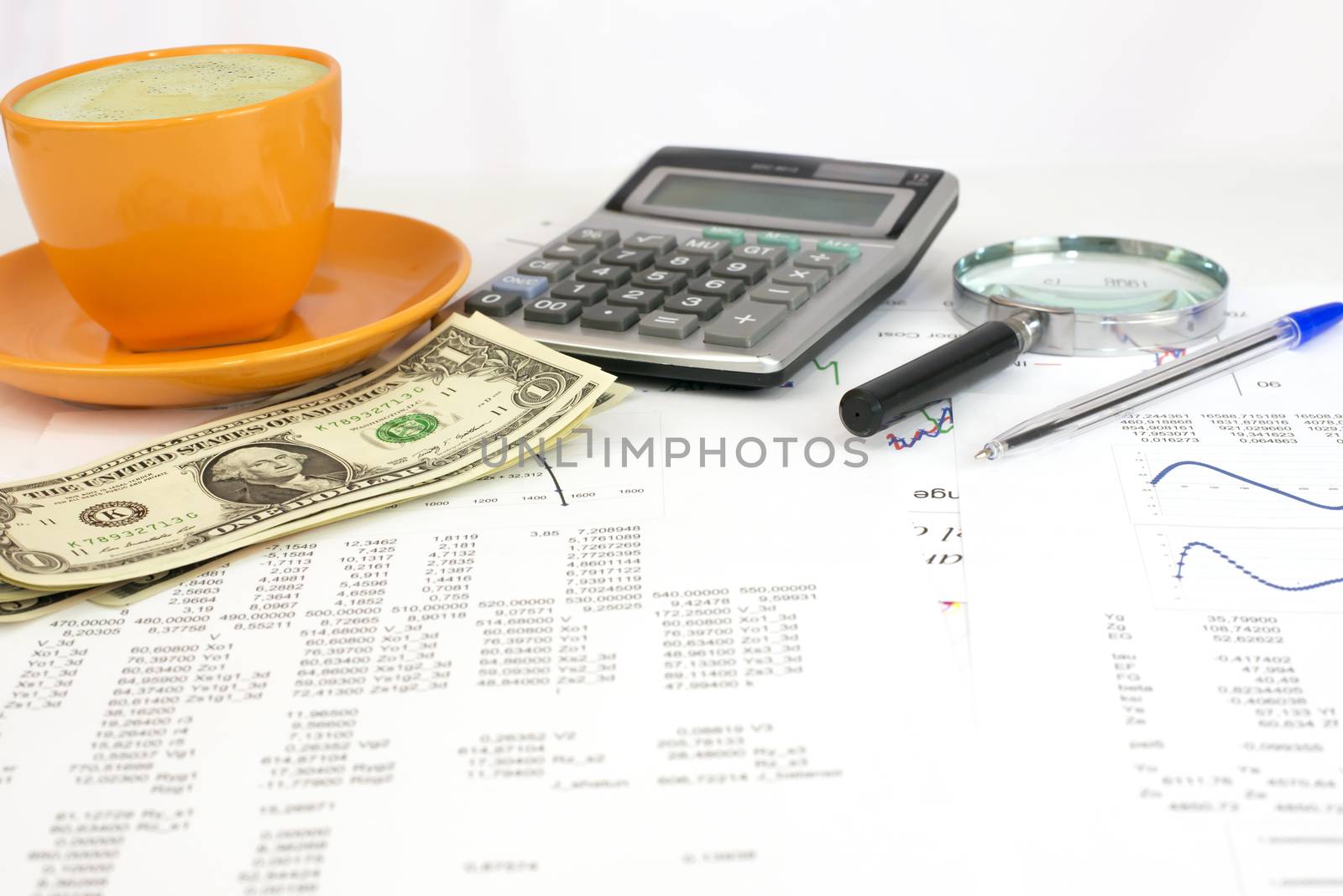 Cup of coffee, business objects and papers by cherezoff