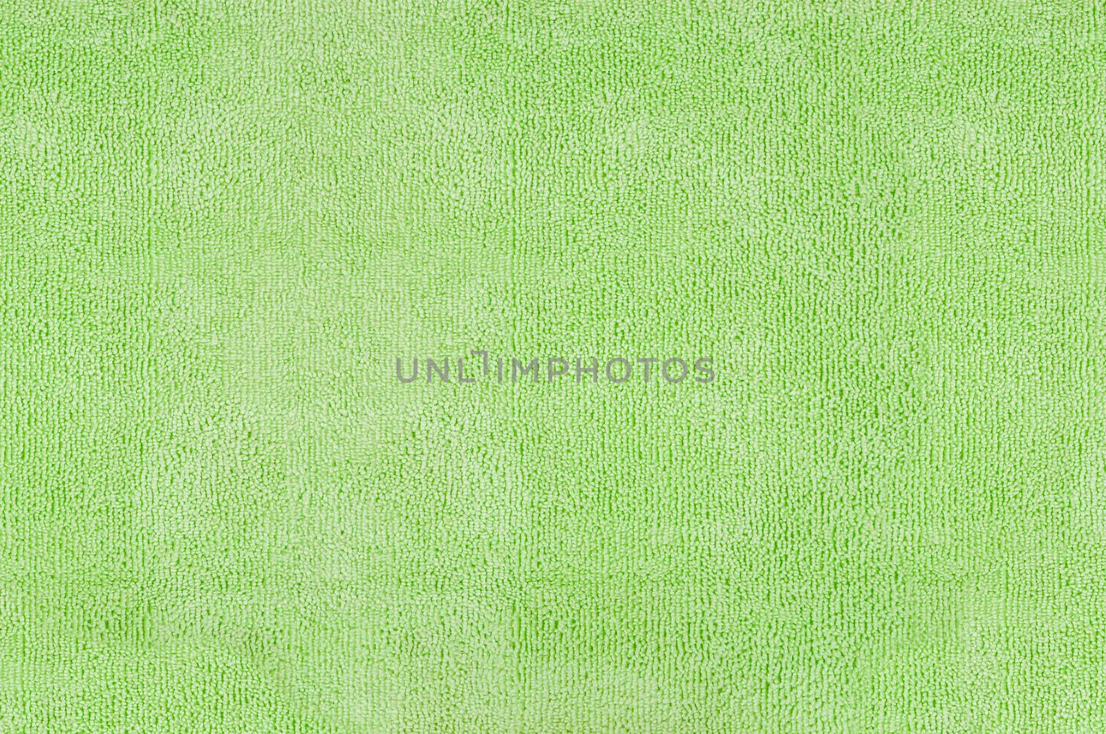 Closeup of green microfiber fabric texture for background