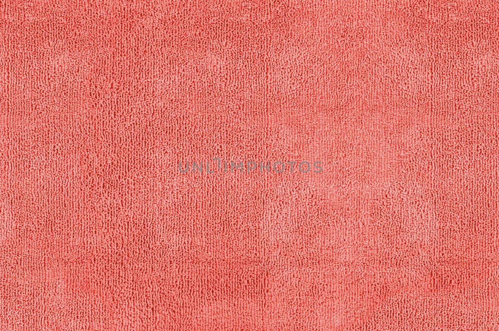 Closeup of red microfiber fabric texture for background