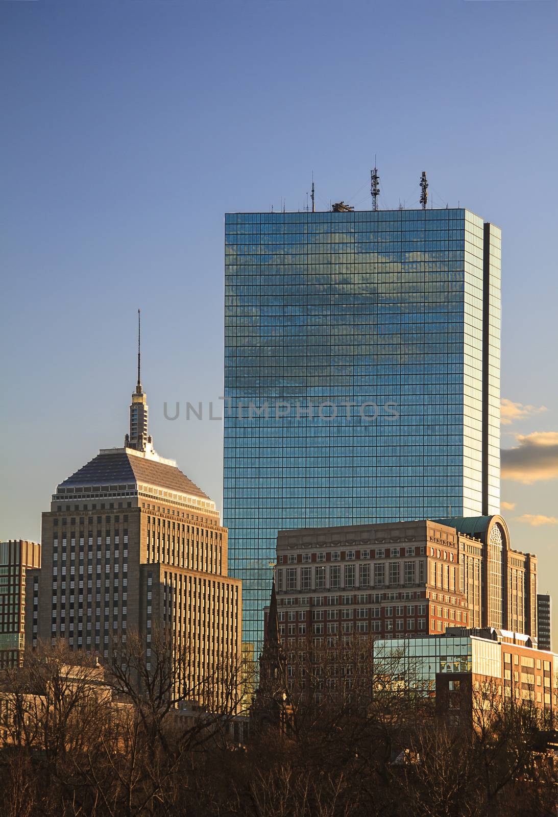 Downtown Boston bathed in the light of the sun setting