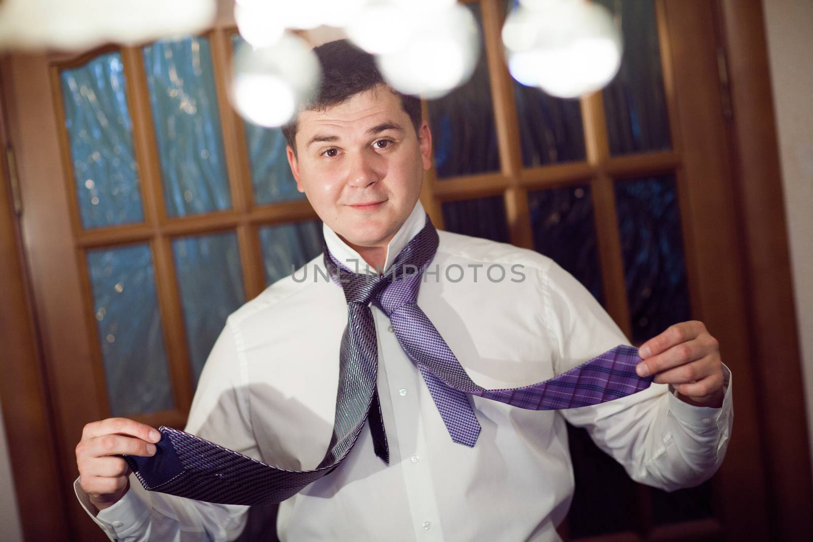 handsome man with two ties by vsurkov