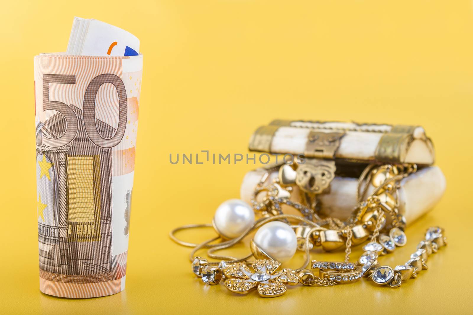 Cash for Gold Jewlery Concept - Concept or Metaphor for selling old gold jewelry for cash