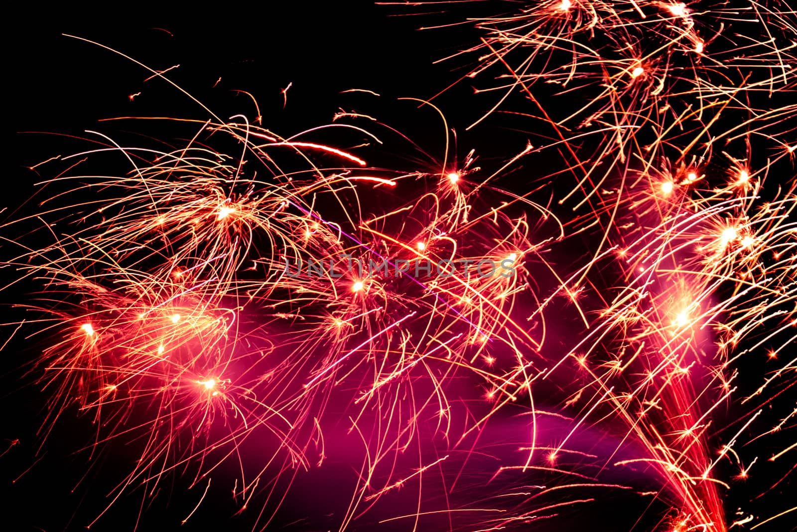 Fire sparks with smoke on black background