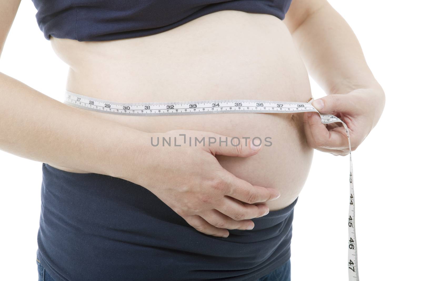 Closeup of pregnant woman at white background