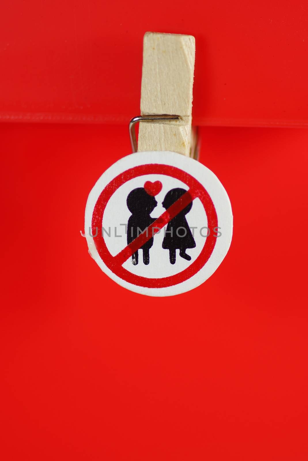 romance  prohibit sign on wooden clip,shallow focus