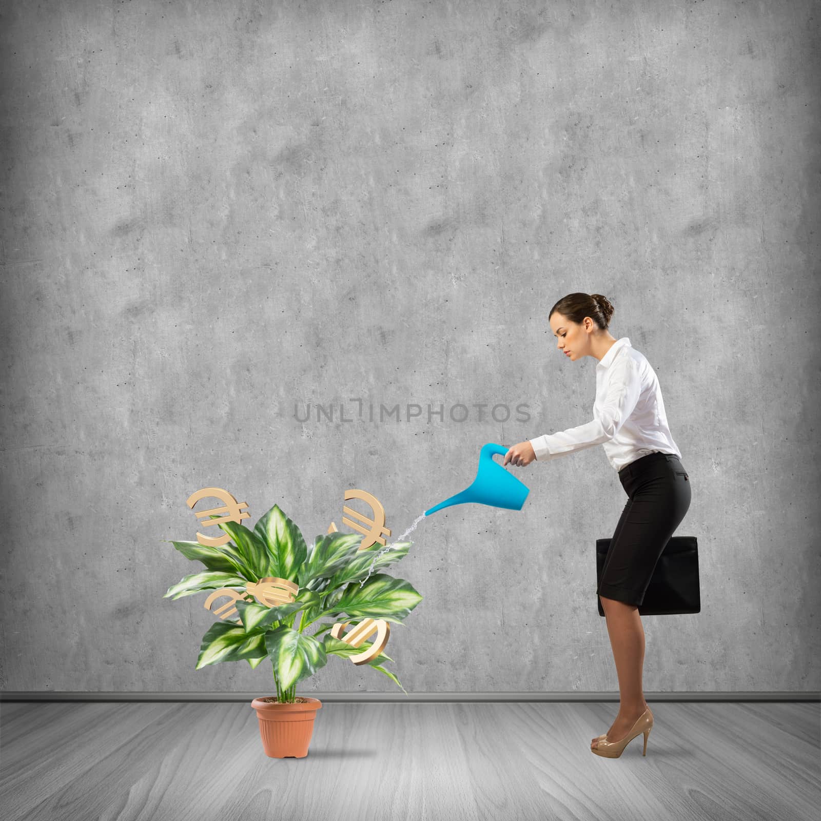 image of a businessman with a watering can