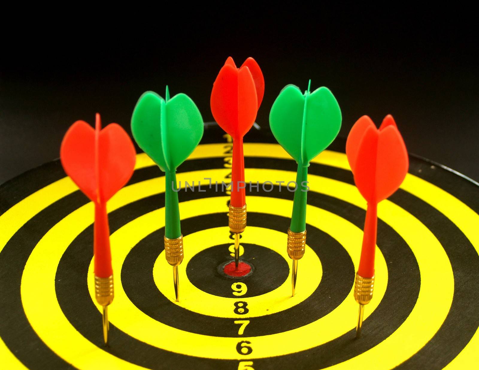 dartboard darts arrows in the target 