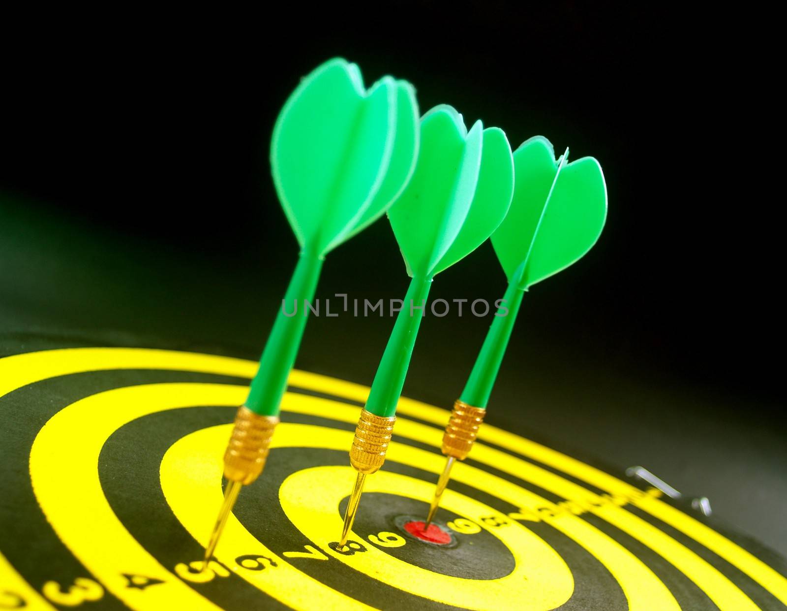 dartboard darts arrows in the target 