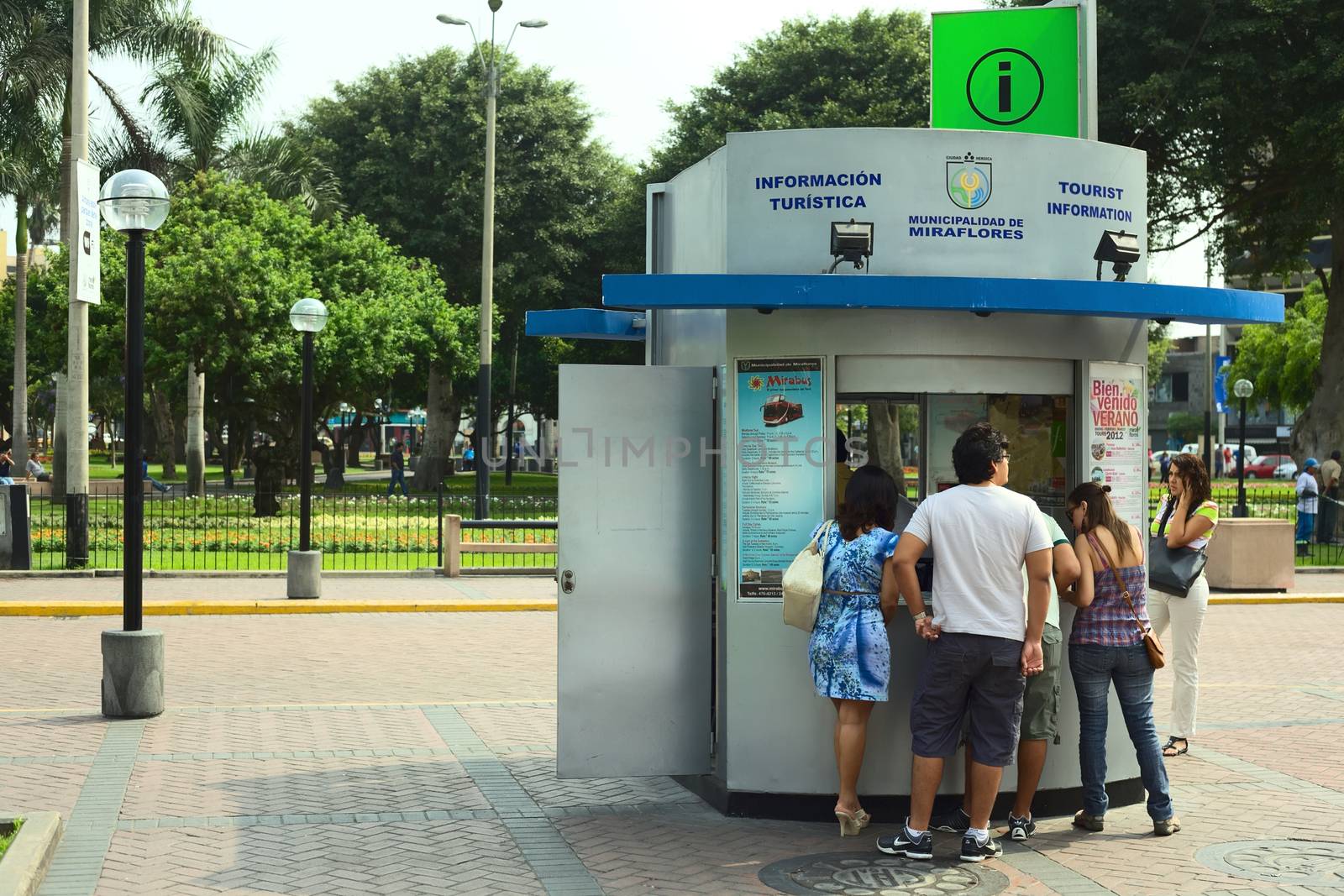 LIMA, PERU - FEBRUARY 11, 2012: Unidentified people at the tourist information at the Kennedy Park in the district of Miraflores on February 11, 2012 in Lima, Peru. Miraflores is the most touristy district of Lima, which has the most infrastructure for tourism.  