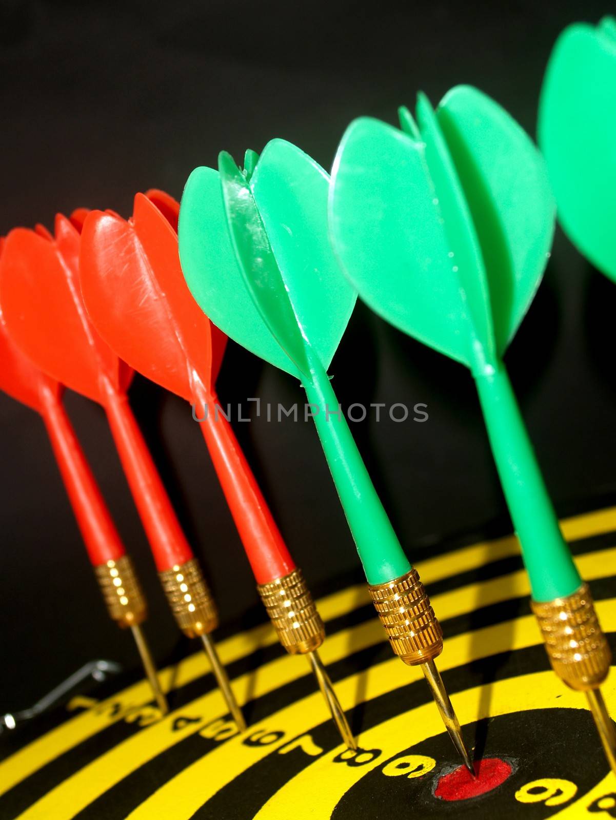 dartboard darts arrows in the target 