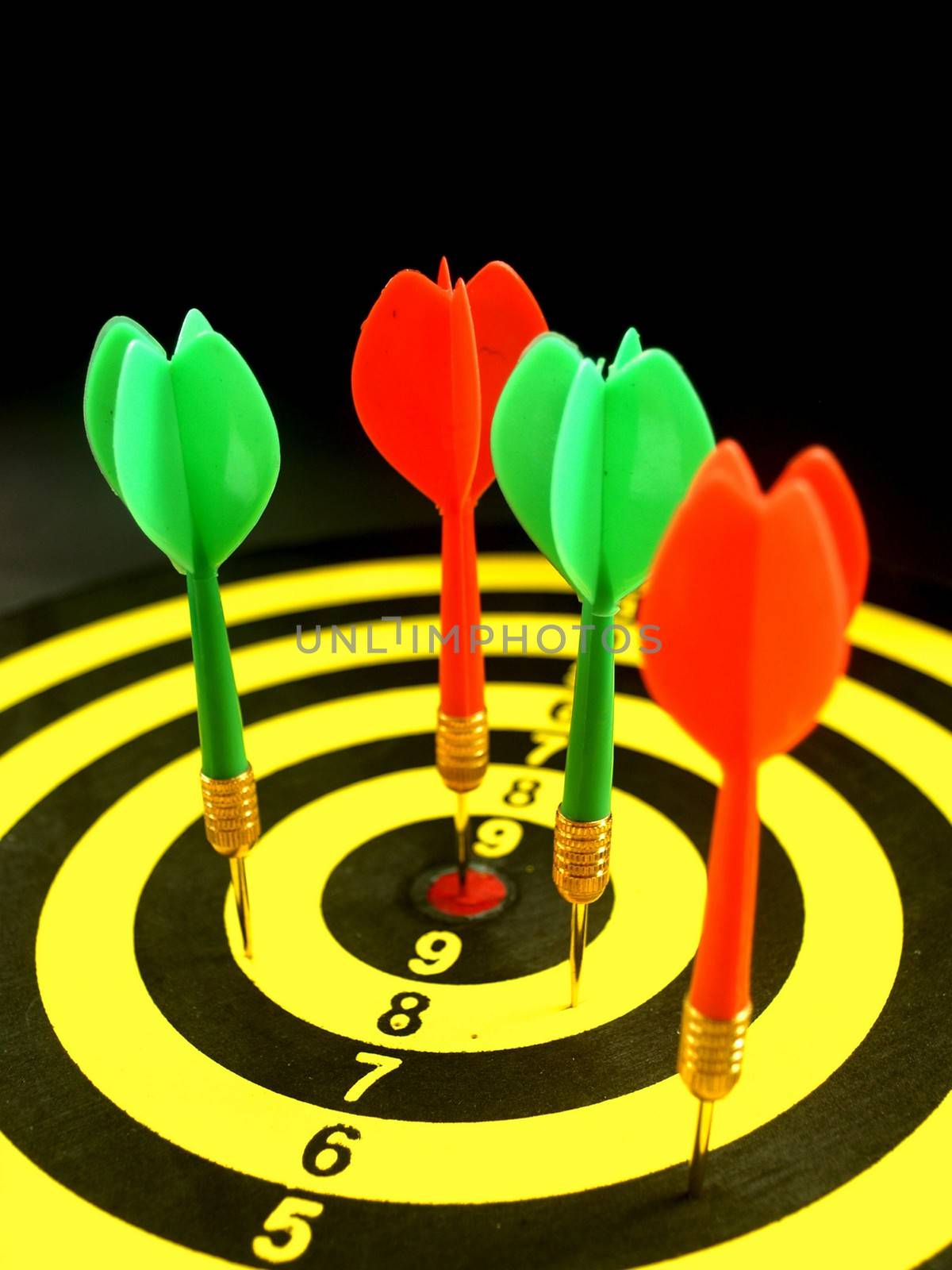dartboard darts arrows in the target 
