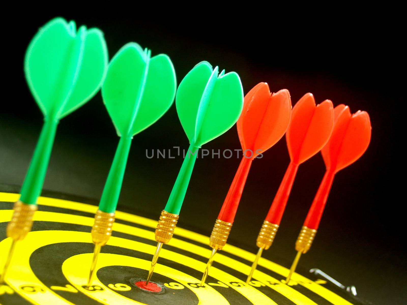 dartboard darts arrows in the target 