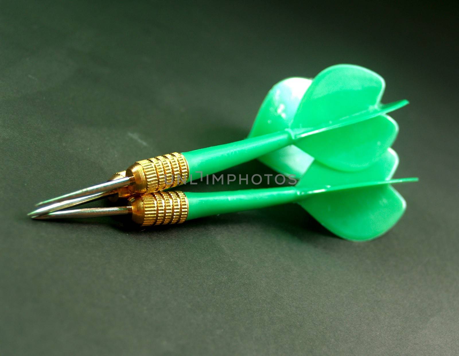 dartboard darts arrows in the target 