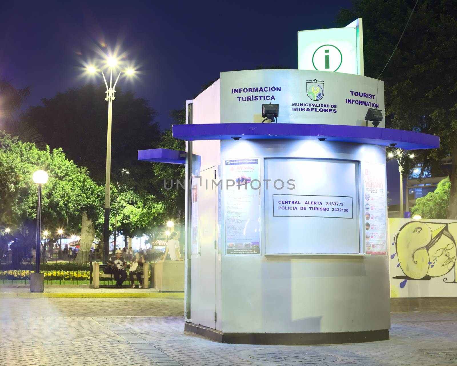 LIMA, PERU - MARCH 5, 2012: Closed tourist information at Kennedy Park in the district of Miraflores in the evening on March 5, 2012 in Lima, Peru. Miraflores is the most touristy district of Lima, which has the most infrastructure for tourism.  