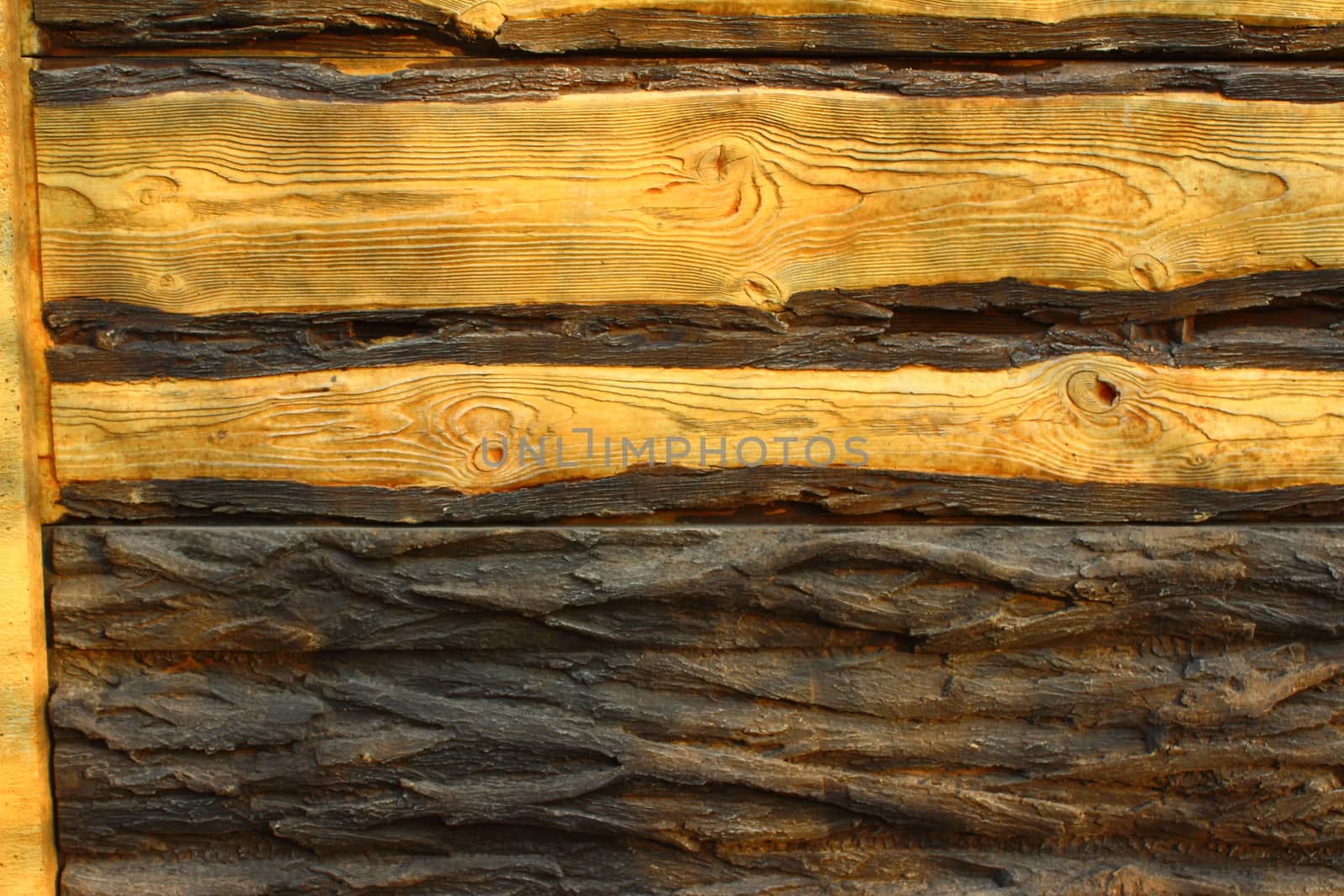 Light brown solid wood planks and tree bark