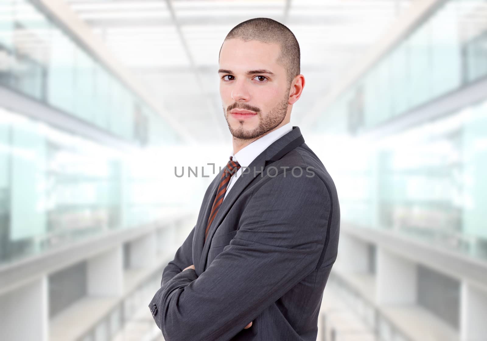 young business man portrait at the office