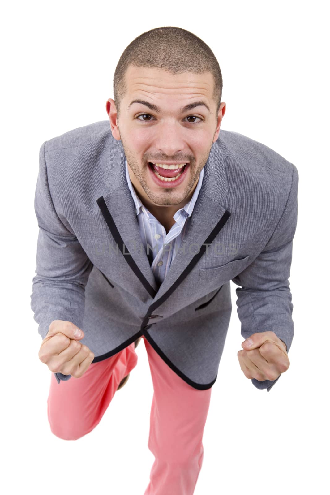 happy young man winning, isolated on white