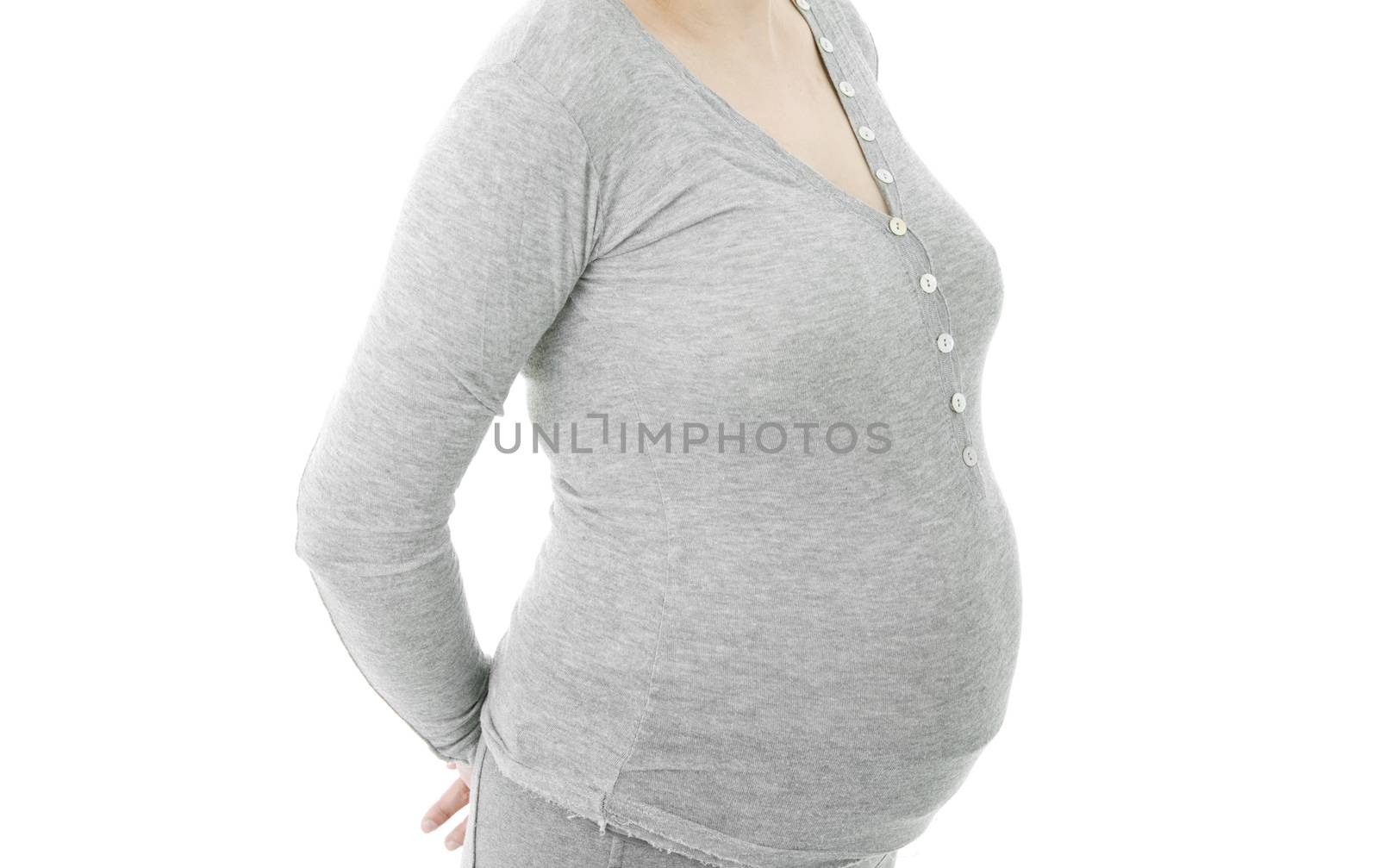 Closeup of pregnant woman at white background