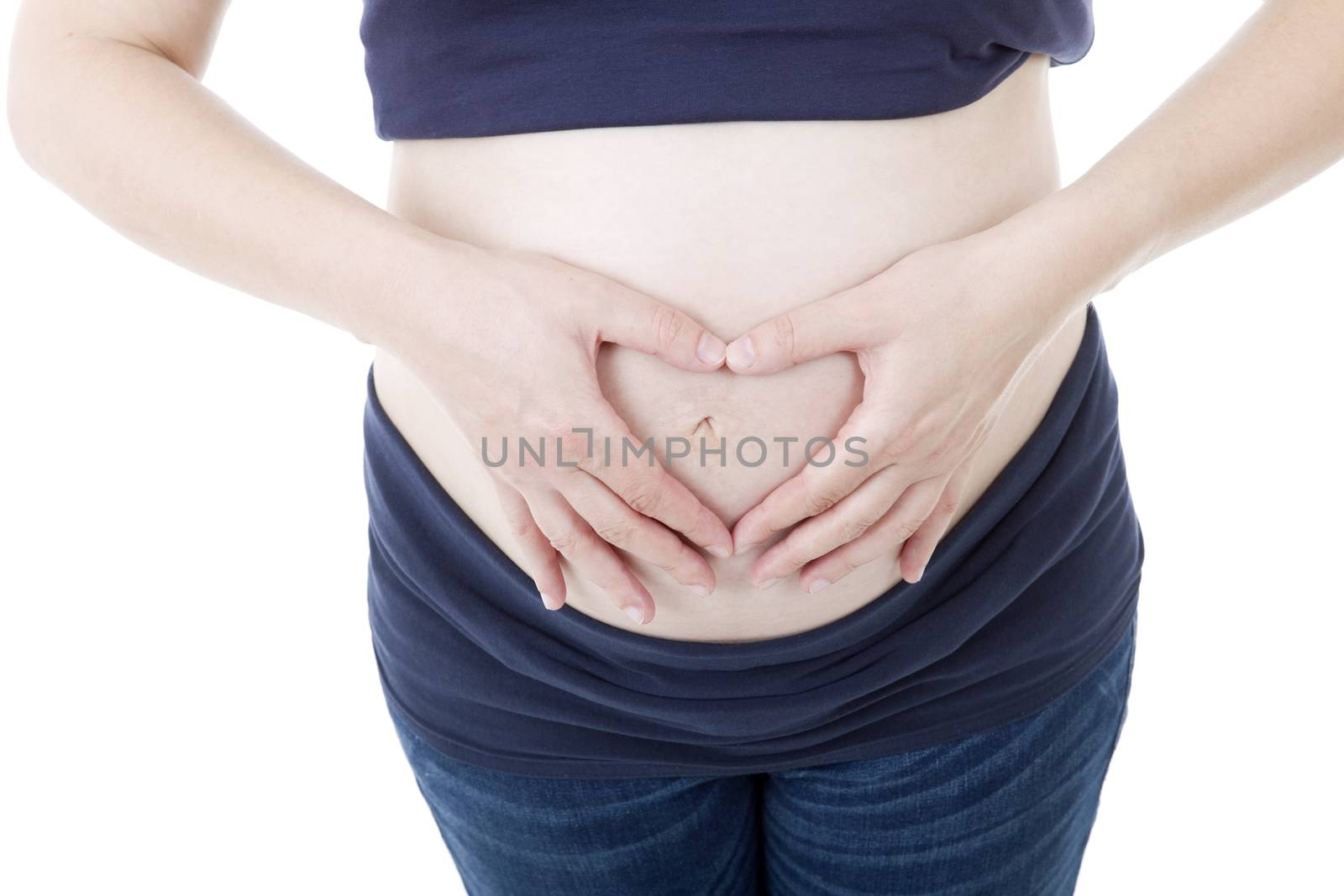 Closeup of pregnant woman at white background