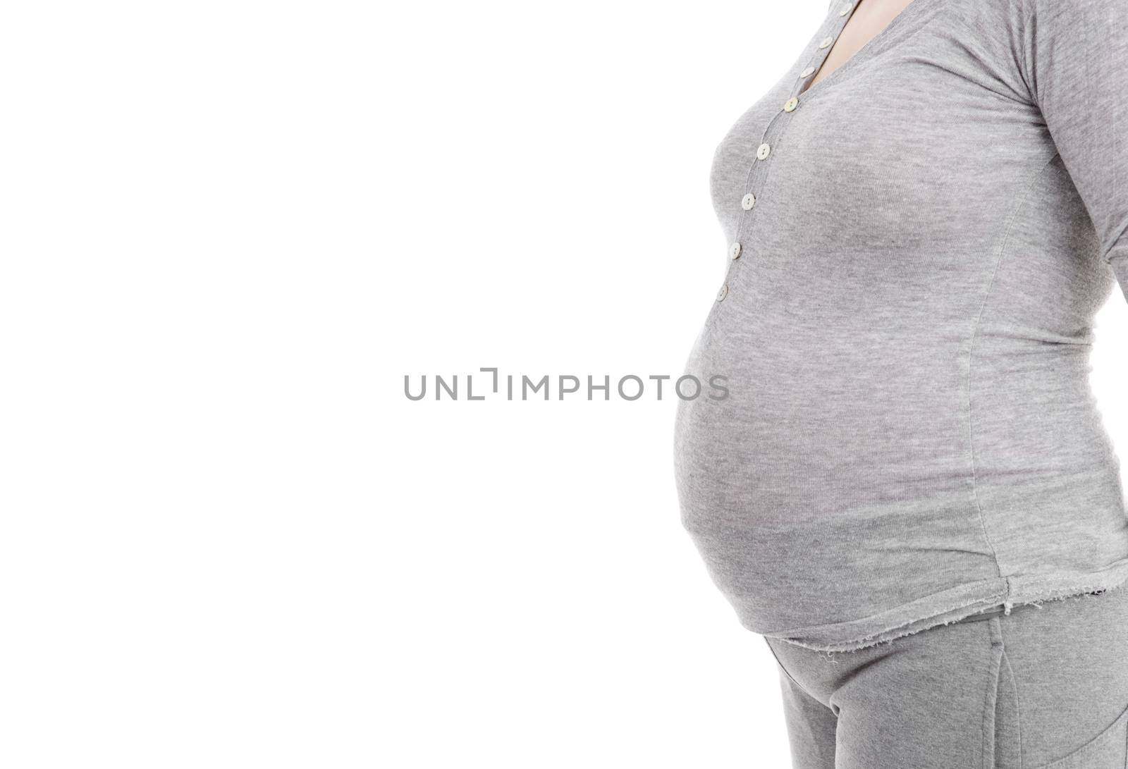 Closeup of pregnant woman at white background