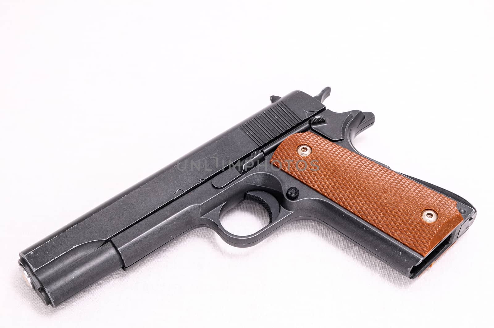 Black semi automatic Handgun on white background
