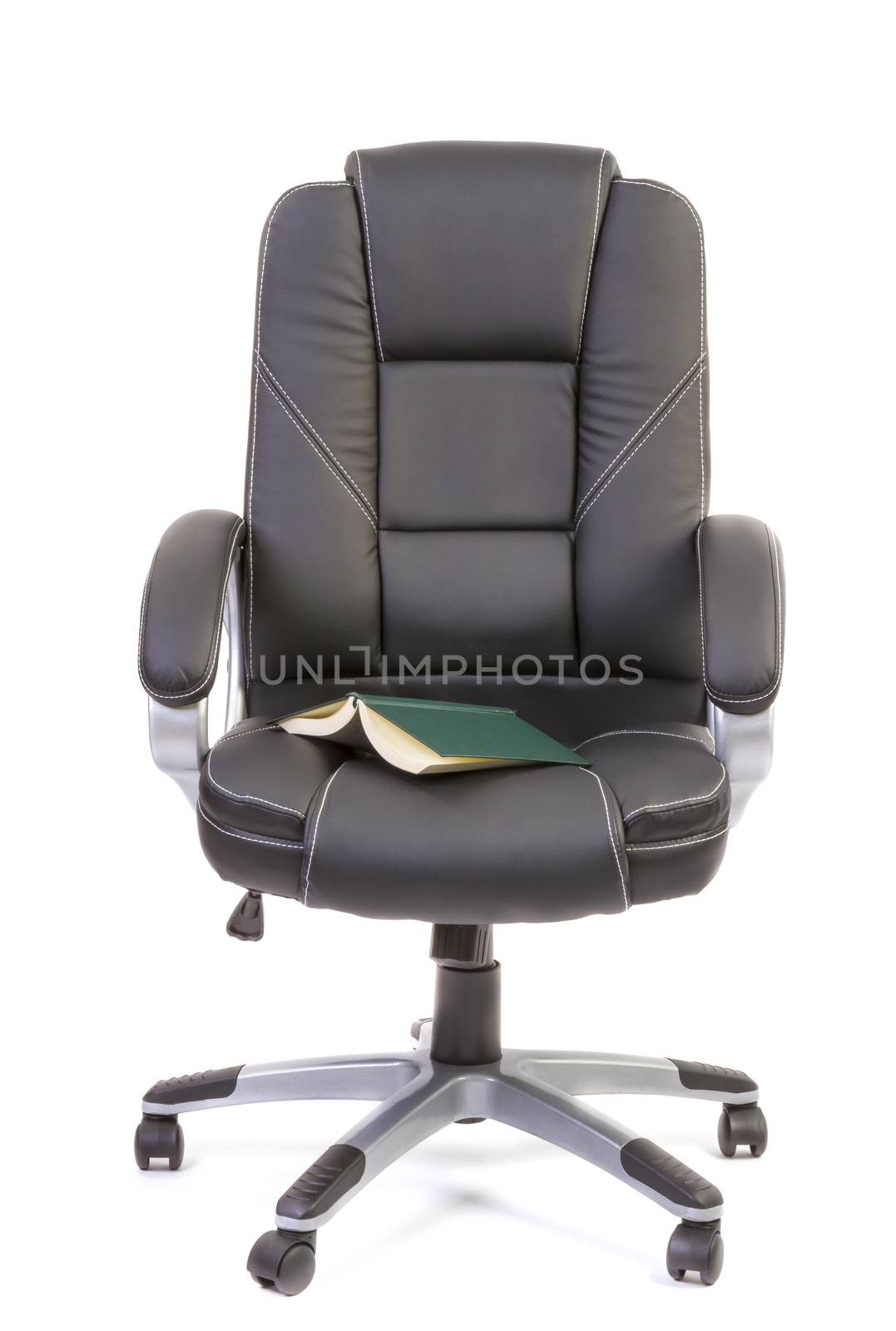 Book on office chair by manaemedia