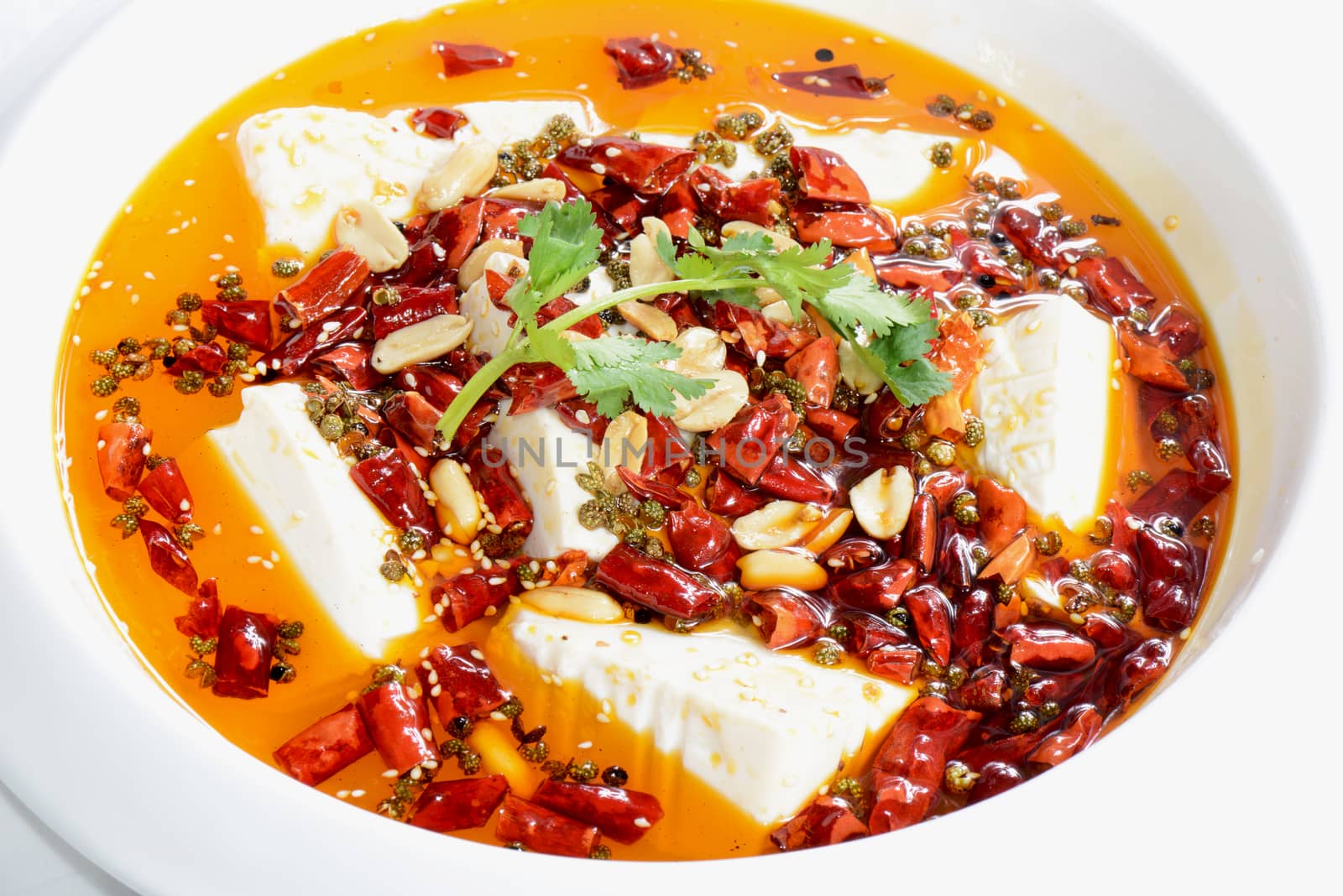 Chinese Food: Boiled Tofu with red pepper in a white plate