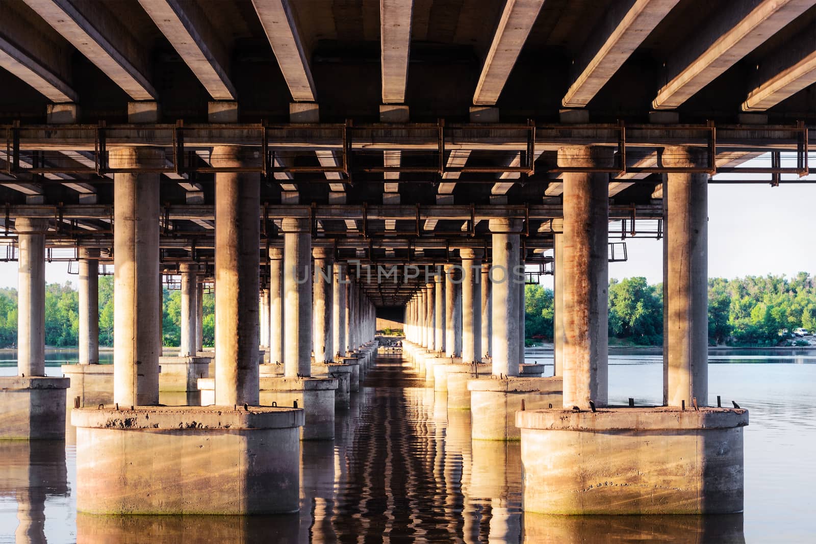 Under a bridge over a wide river
