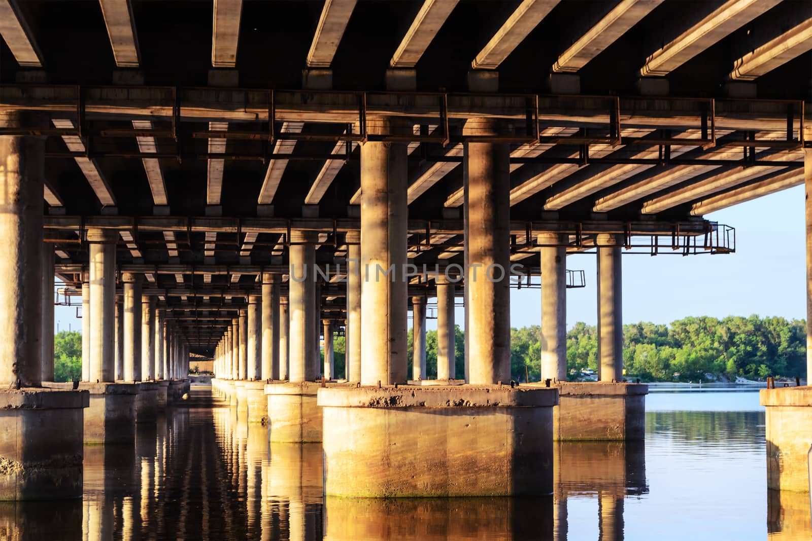 Under a bridge over a wide river