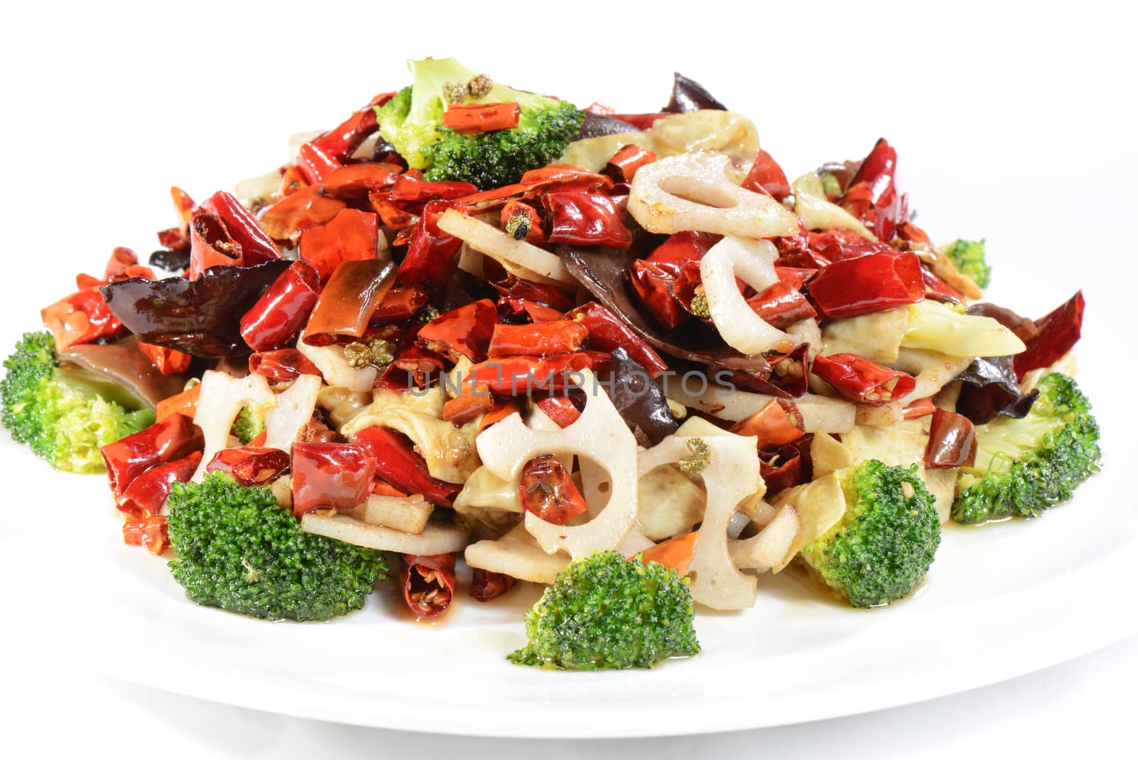 Chinese Food: Fried vegetables with pepper in a white plate