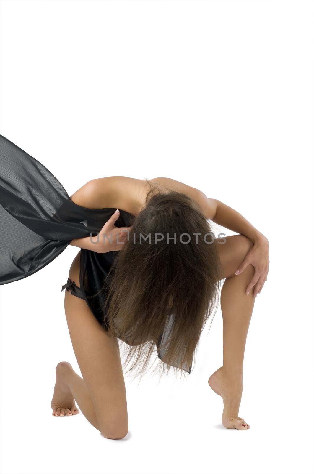 cute brunette with black fabric on body covering face with hair