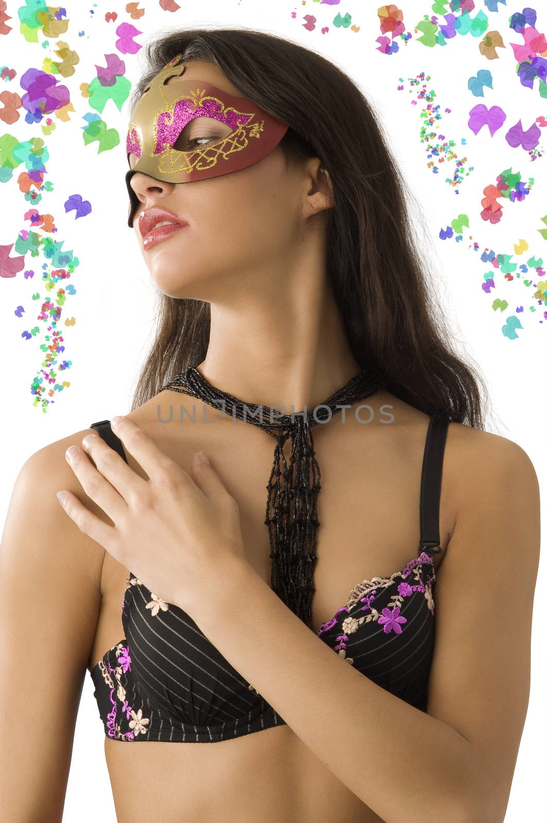 nice portrait of young graceful brunette in bra and carnival mask