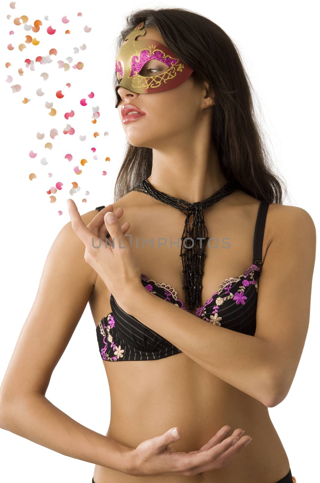 beautiful brunette wearing bra lingerie hiding face with golden mask