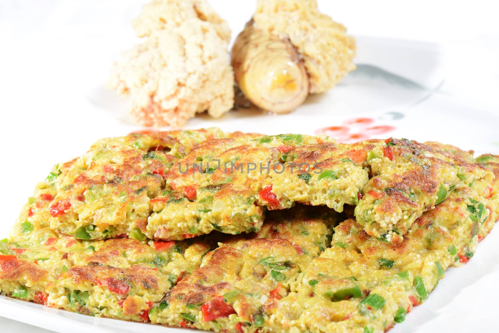 Chinese Food: Fried roe cakes in a white plate