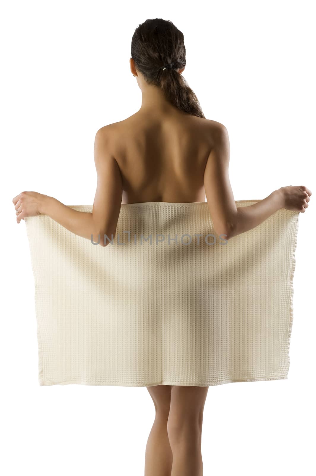 beauty portrait of pretty woman dressing a white bath towel and showing her naked shoulder