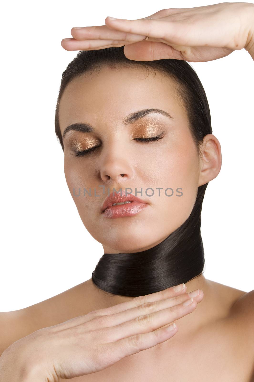 portrait of a young brunette model taking pose with closed eyes and hair ac necklace