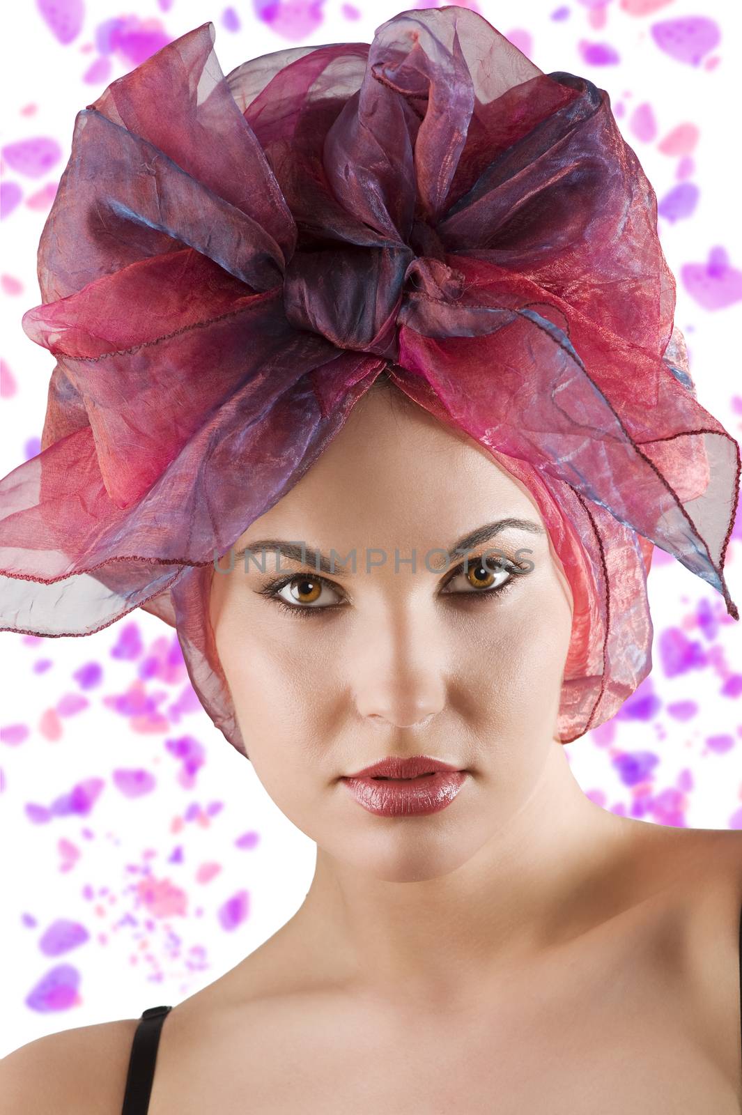 close up portrait beautiful woman with a colored headscarf looking like a brasilian girl