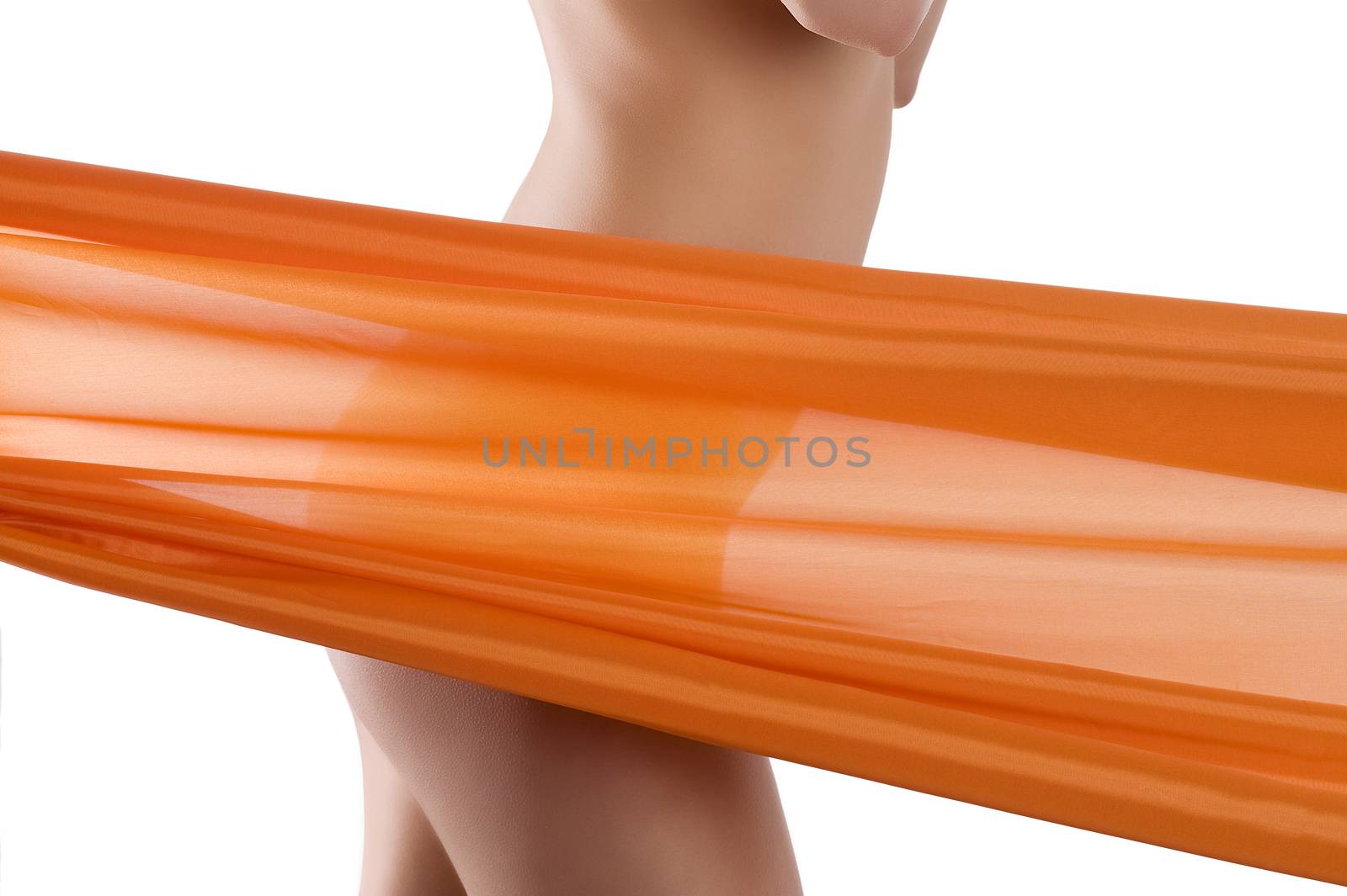 close up on a naked woman body behind a transparent orange material beauty wellness concept