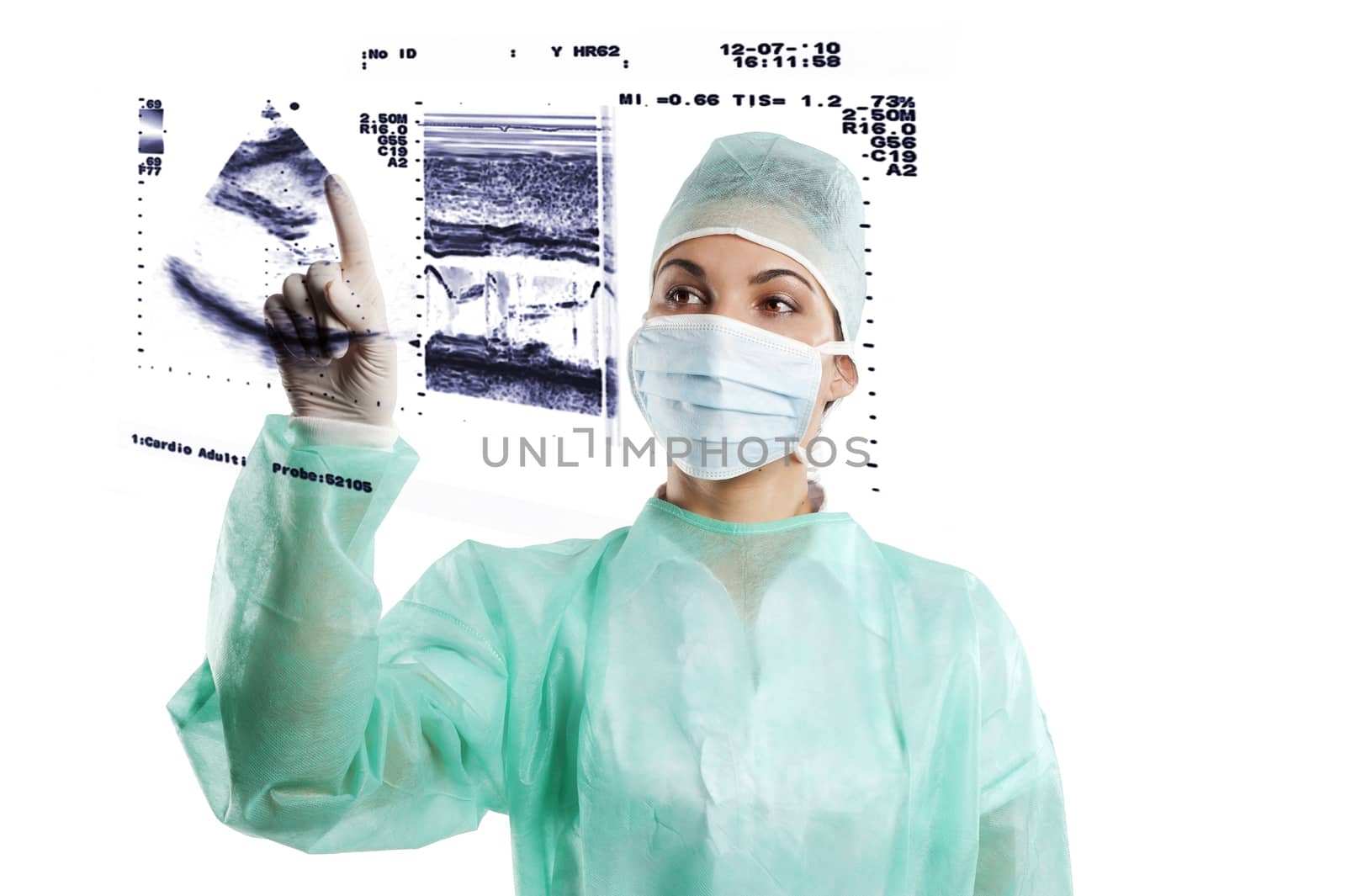 pretty nurse wearing a surgery dress with cap isolated over white touching a screen