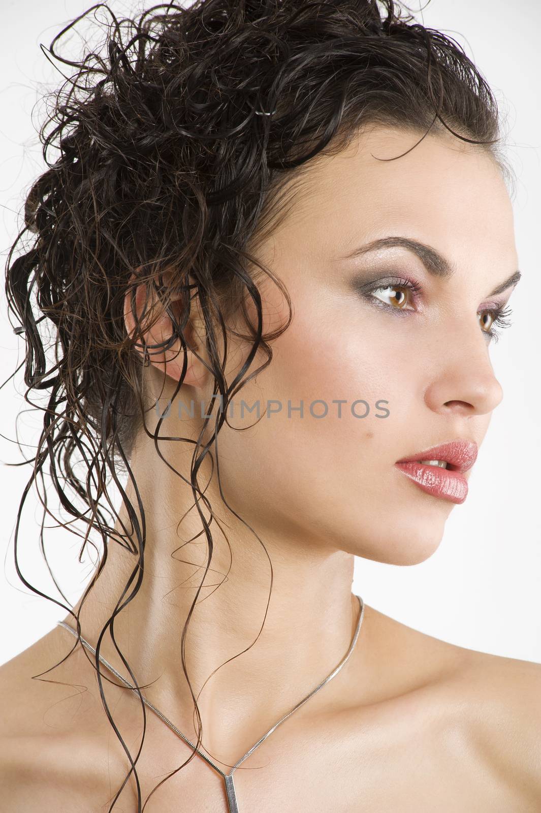 young beautiful brunette woman with hair style and nice jewellery