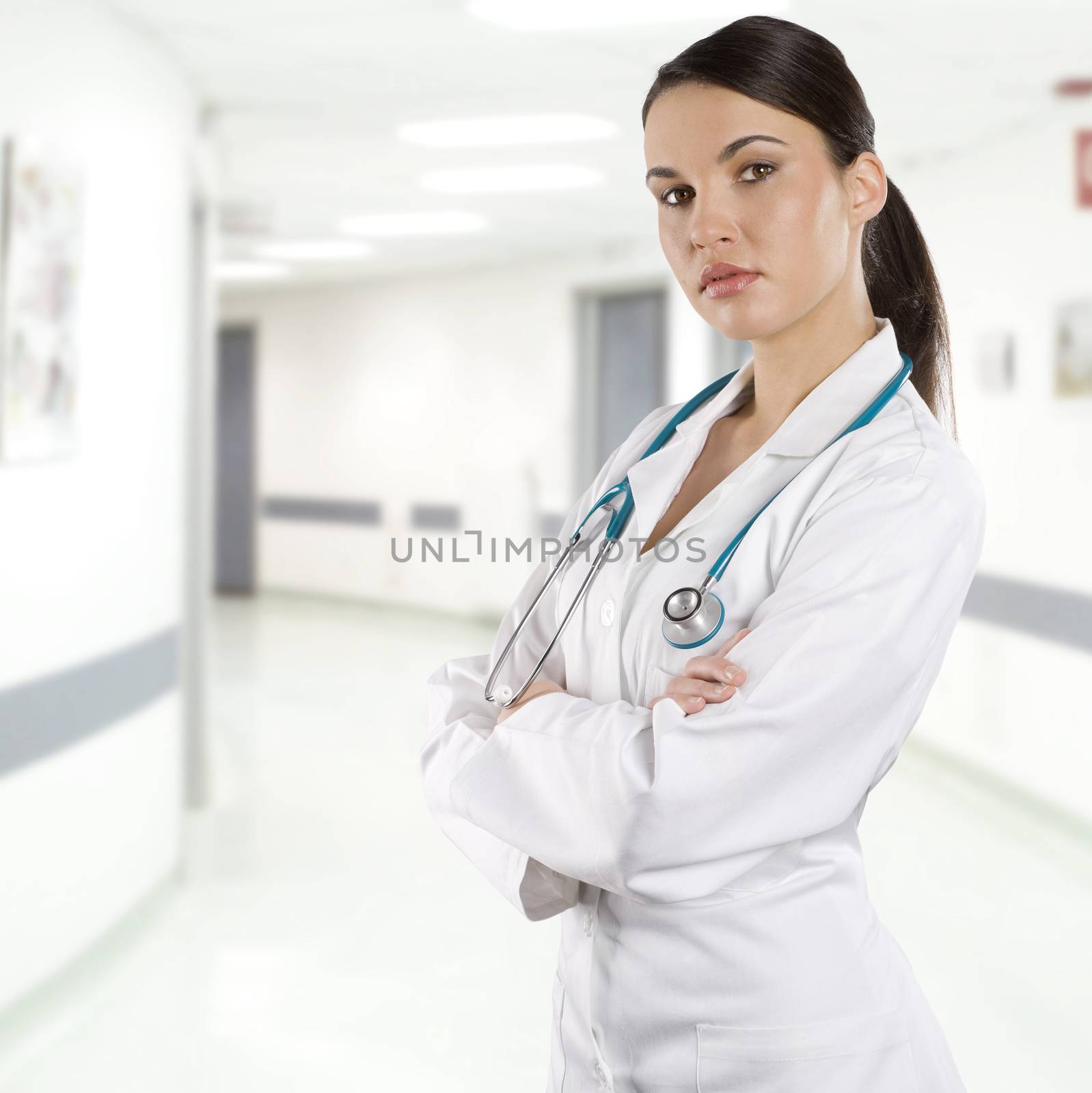 smiling medical doctor woman with stethoscope Isolated over white background