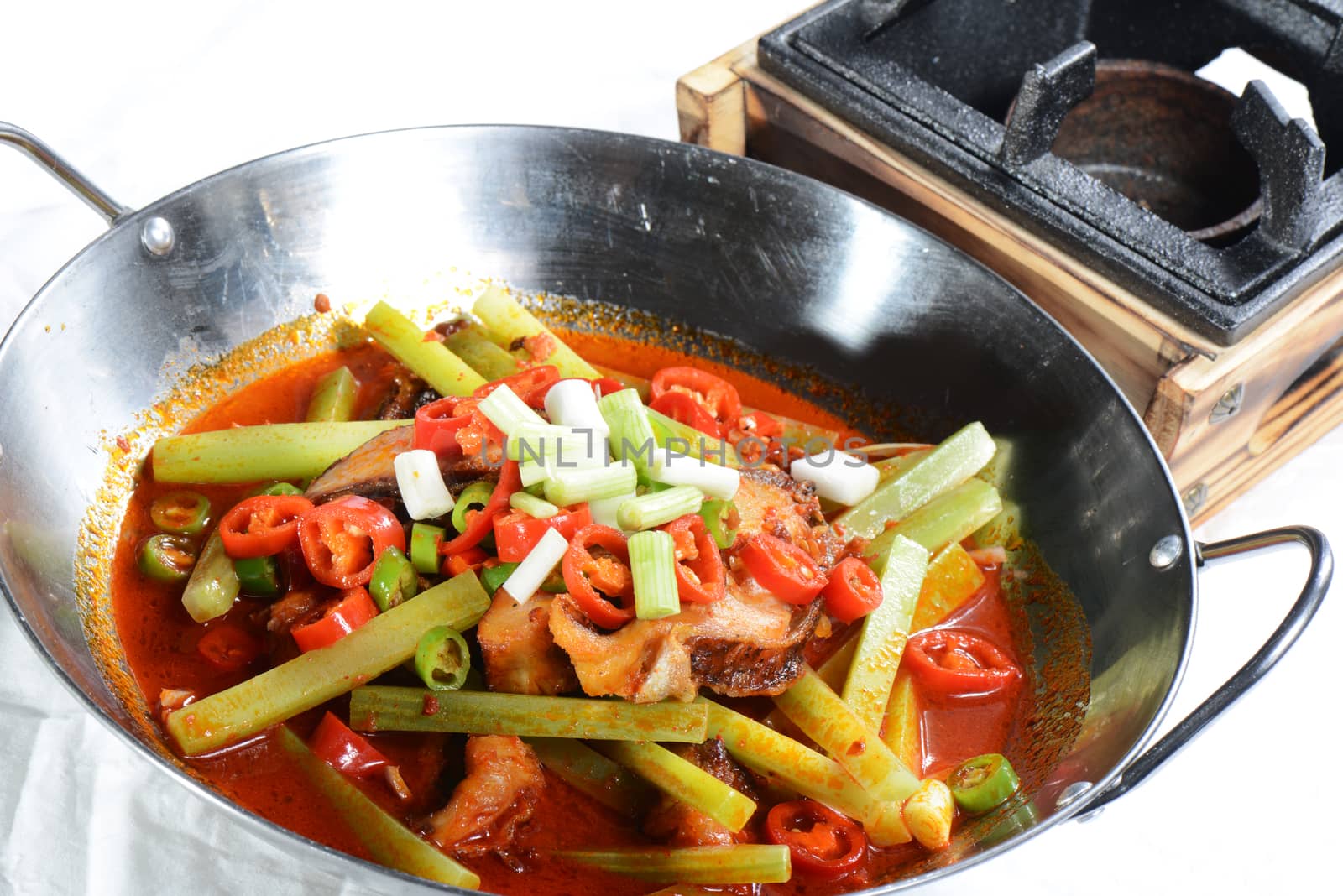 Chinese Food: Fried fish slices with pepper in a pot