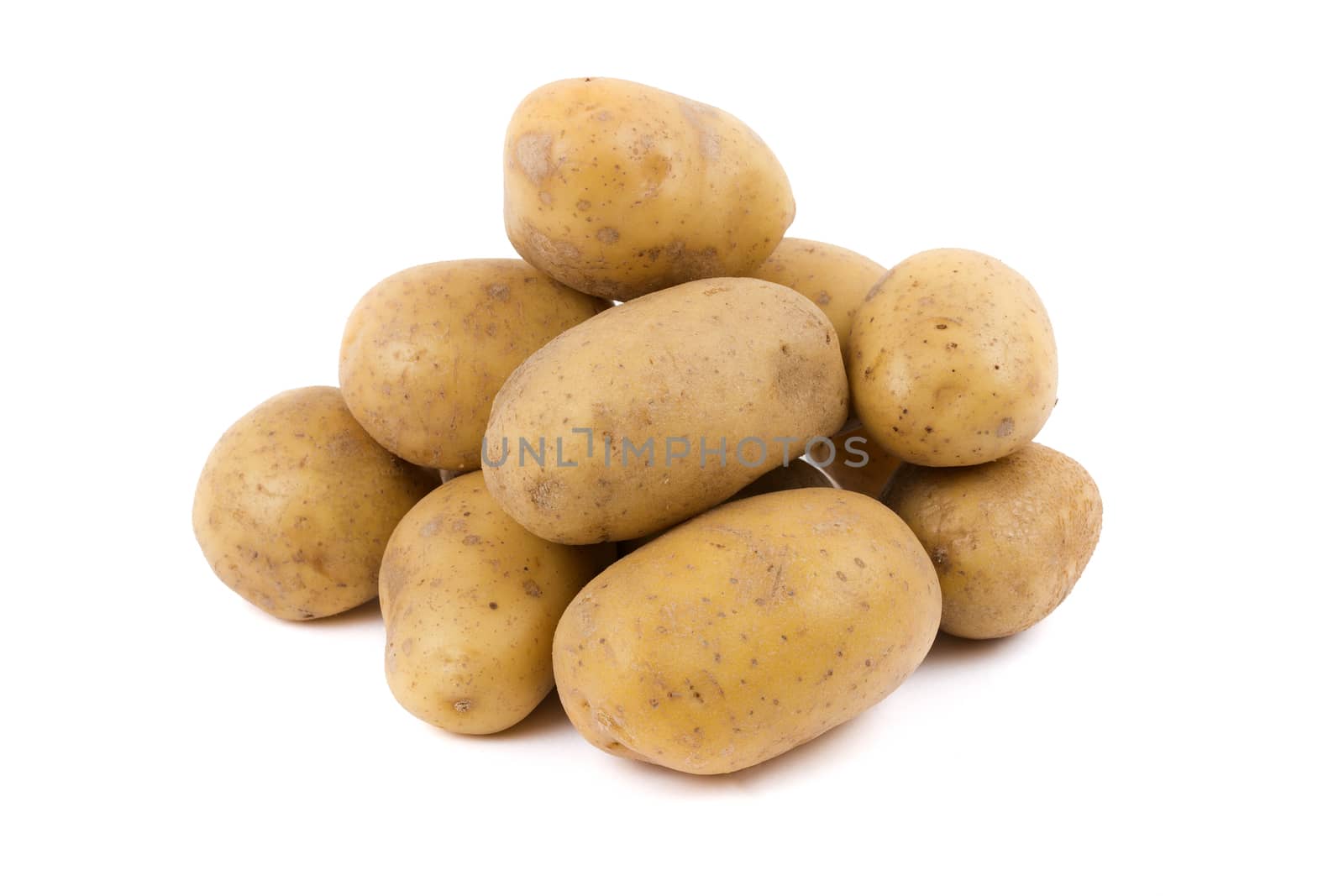 Fresh potatoes on a white background
