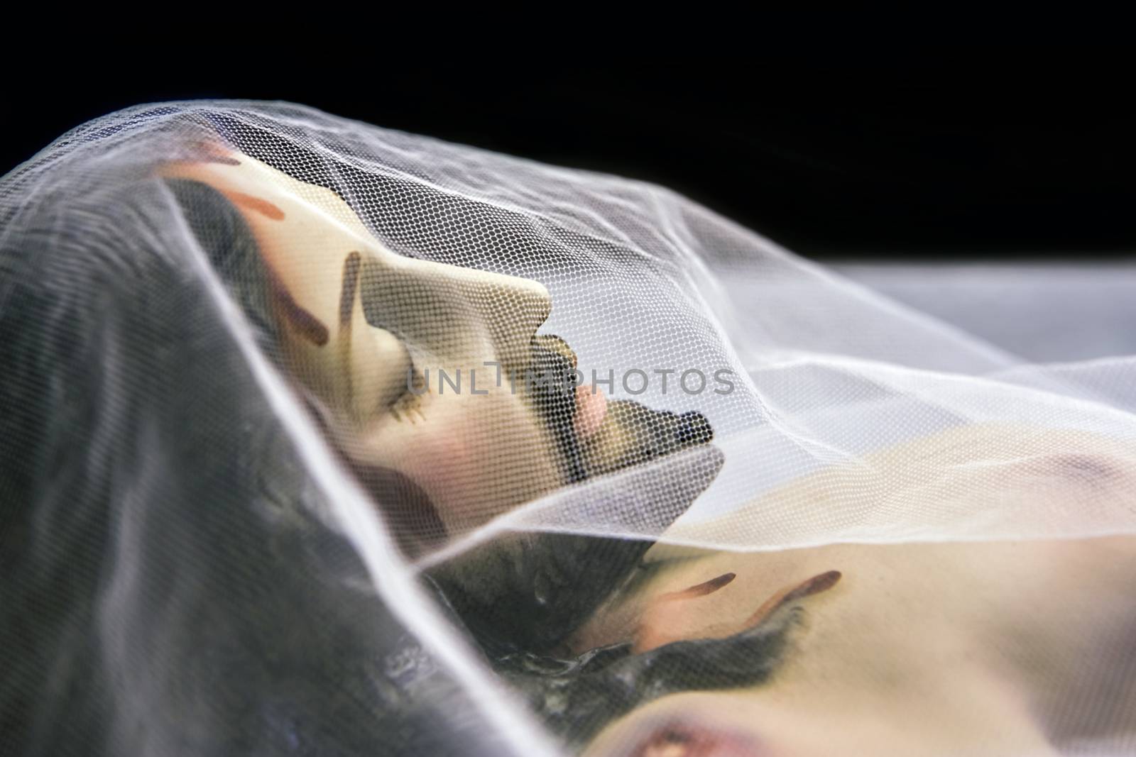 Sculpture of reclining Jesus in the holy tomb by digicomphoto