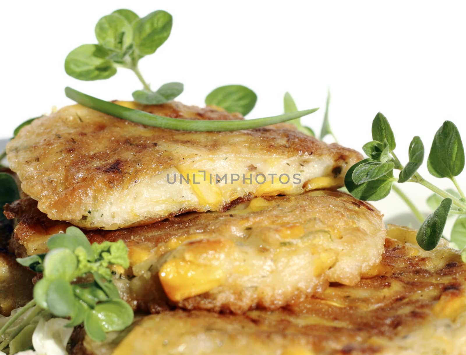 It is fried pancakes with sweet corn