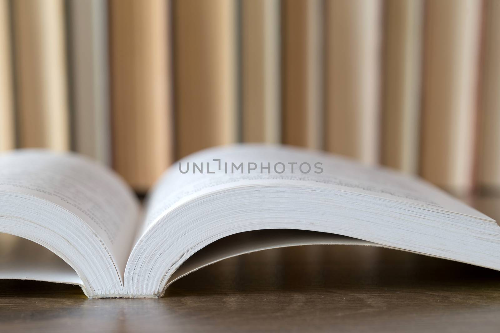 books on wooden deck tabletop