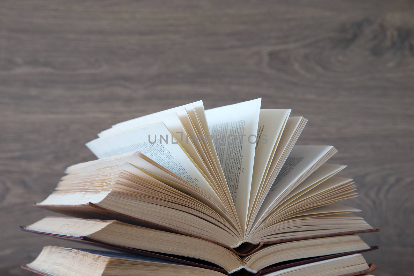 books on a wooden background