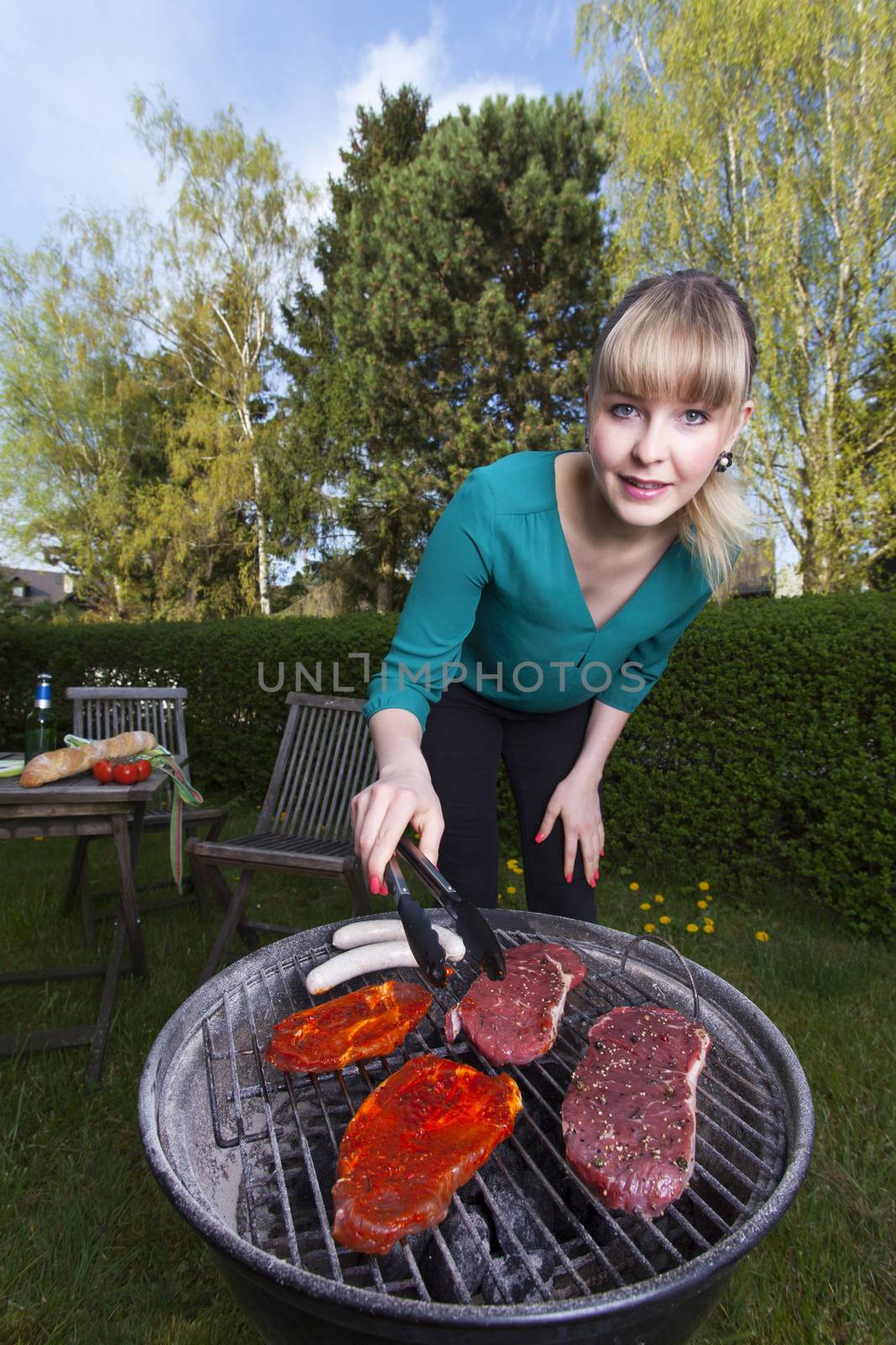 woman and a barbecue