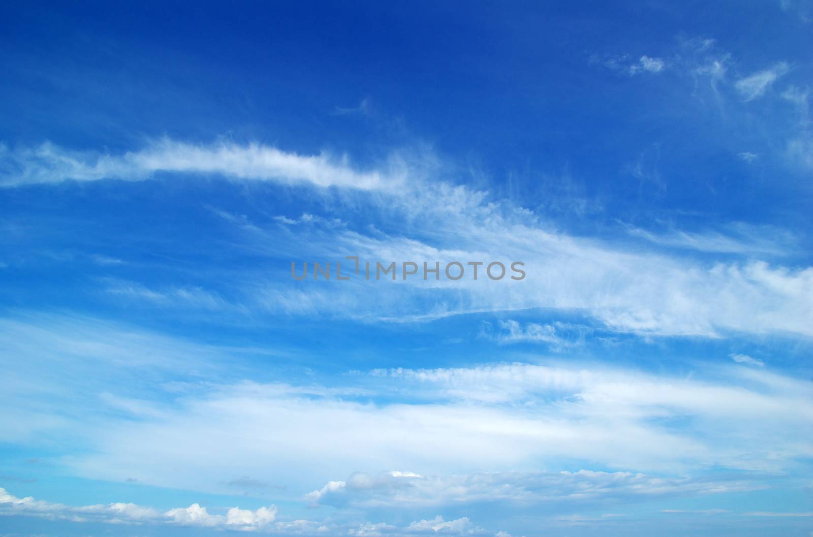 blue sky background with a tiny clouds