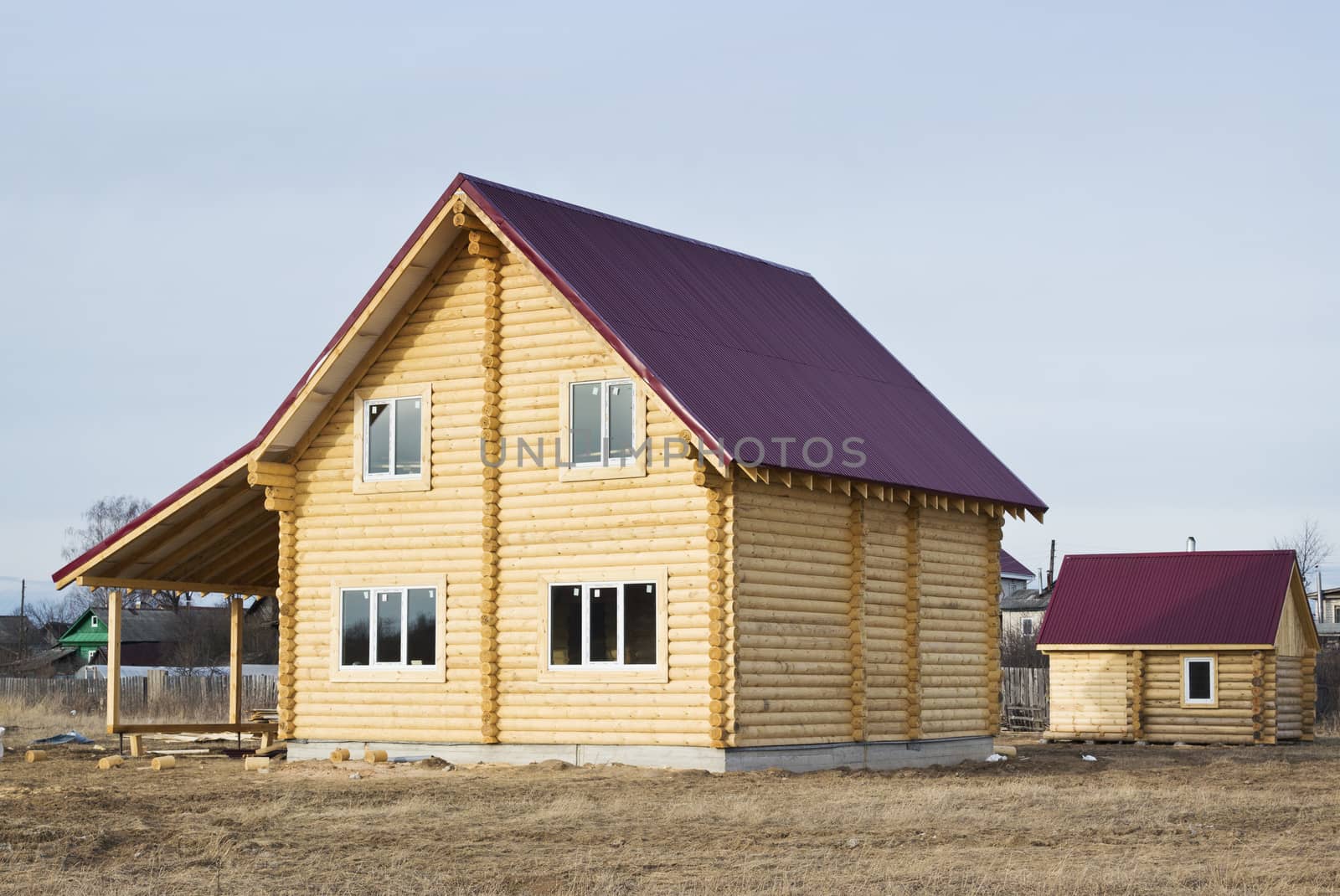 New log house and the vaporarium in distance